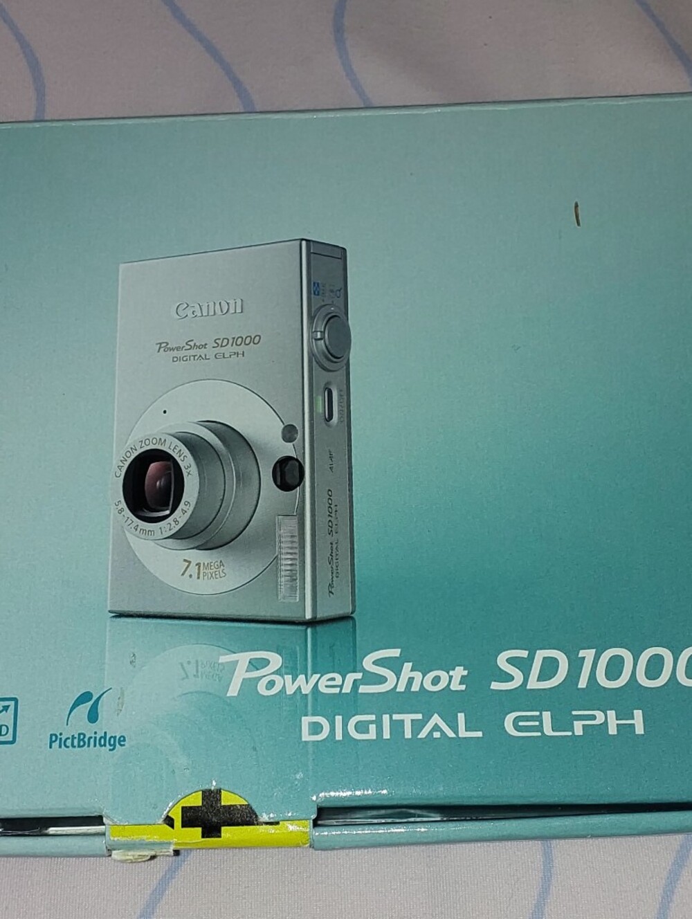Canon PowerShot SD1000 Digital ELPH Point-and-Shoot Camera (BLUE)